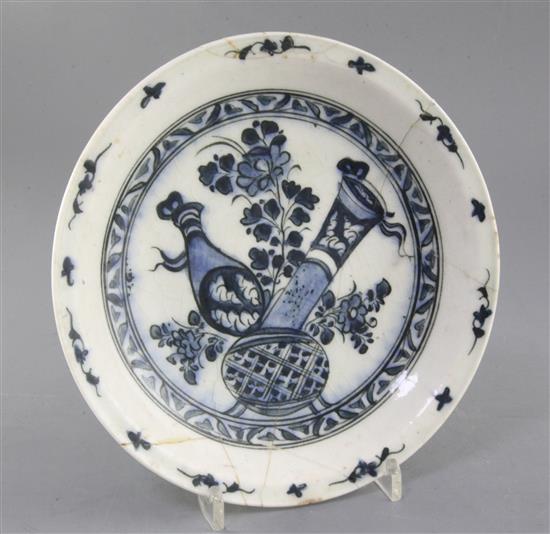 A Safavid underglaze blue and black painted dish, Iran 17th century, diameter 21.5cm, repaired